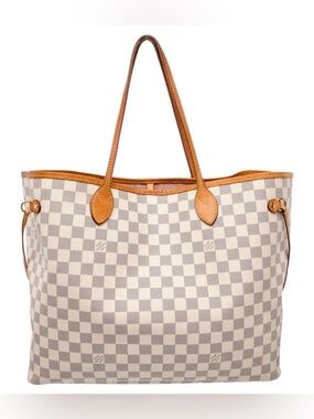 Louis Vuitton LV Neverfull MM tote is crafted from white and blue Damier Azur